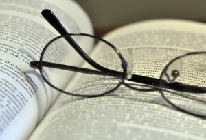 book with glasses